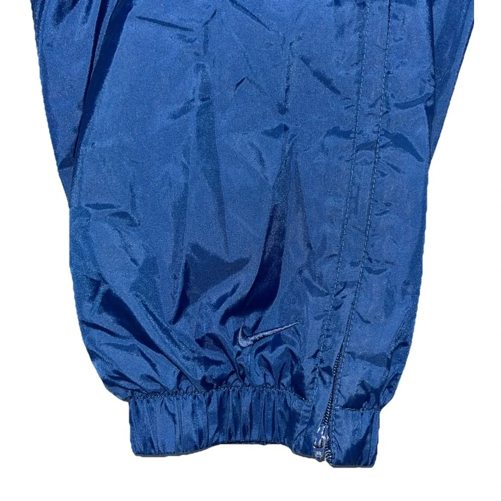 Vintage Nike Youth M (8-10) Blue Nylon Track Pants Zip Ankle Cinch Waist Retro